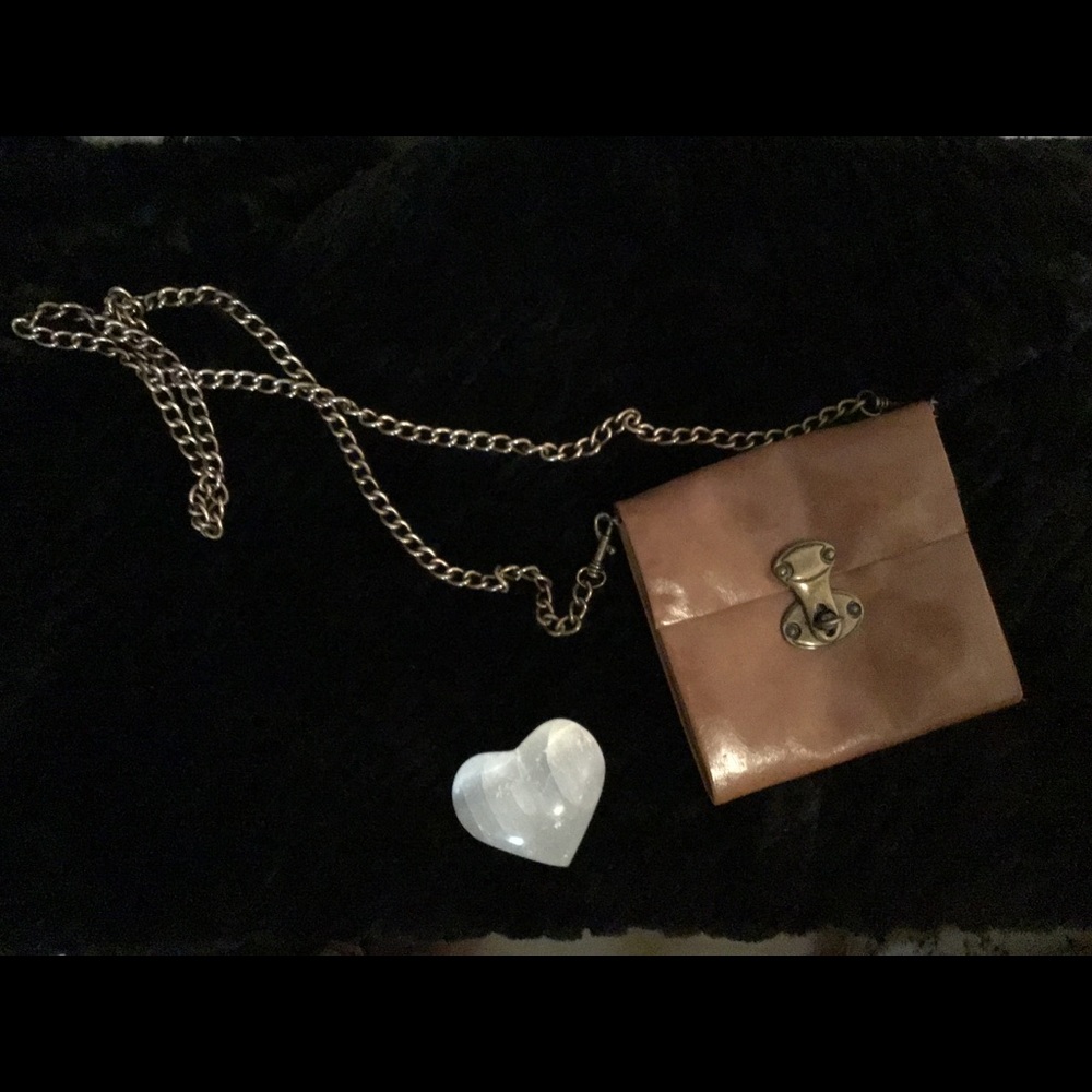 Cross body miniature purse.
